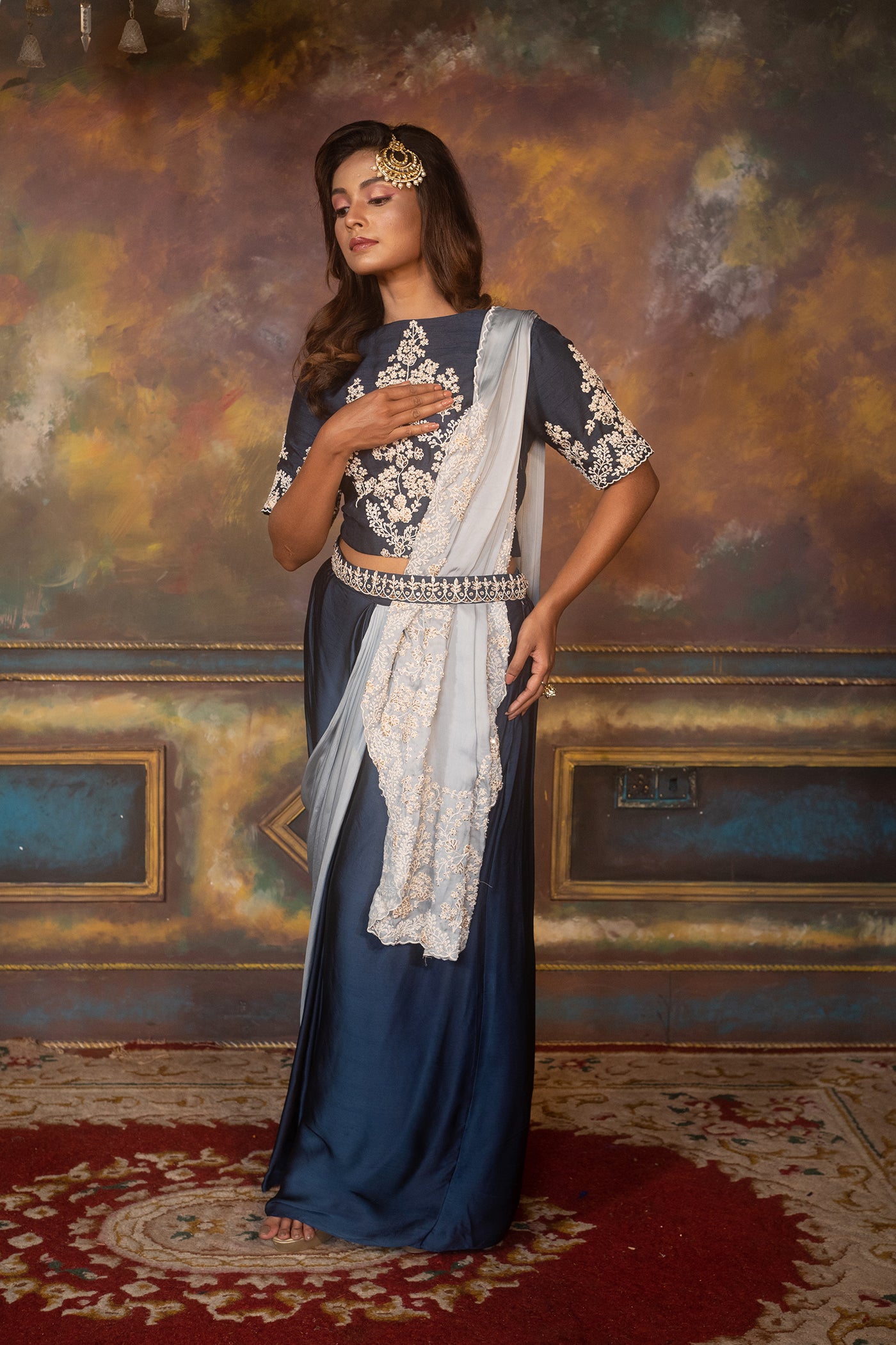 Crop Top And Cowl Skirt With Attached Drape And Embroidered Belt